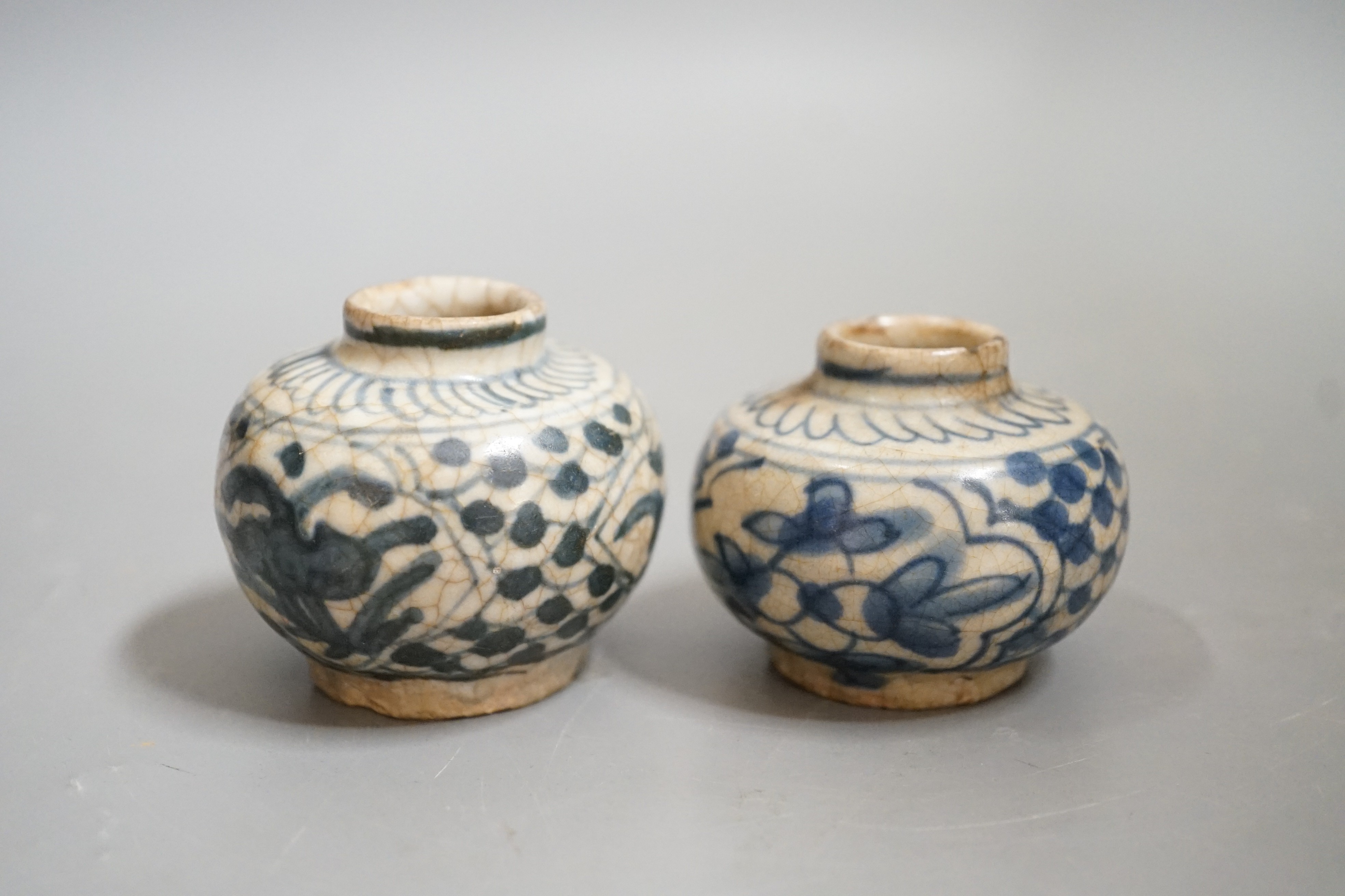 Two Chinese Swatow blue and white jarlets, early 17th century, 5cm tall